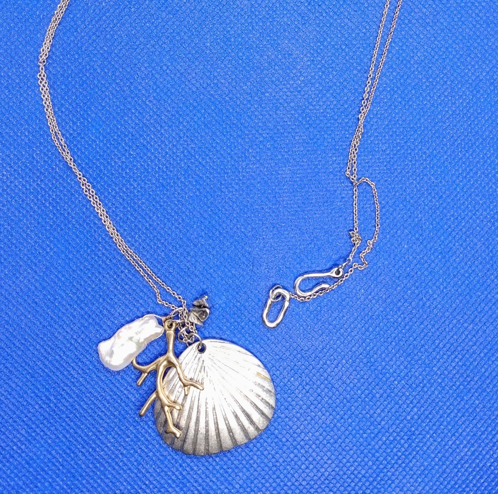Elegant Silver Necklace with Shell and Pearl Accents